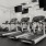  A gym with treadmills and televisions mounted on the wall.