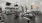  A gym with a variety of exercise equipment including treadmills, stationary bikes, and weight machines.
