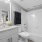  A white bathroom with a toilet, sink, and bathtub.